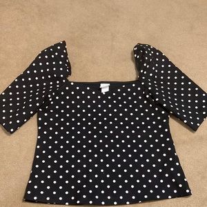 Cute polka dotted sweetheart neckline top!